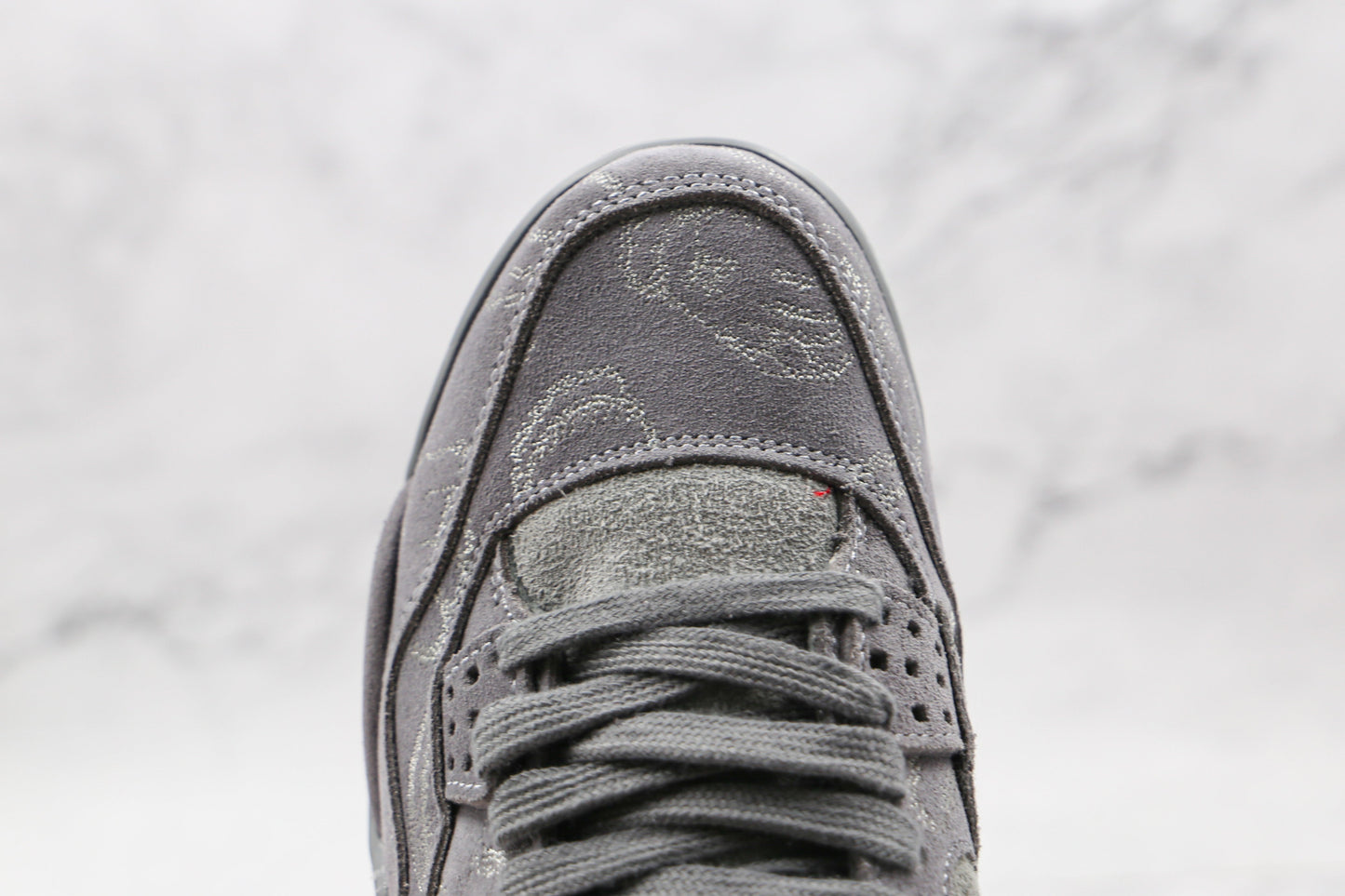Jordan 4 Retro Kaws 
