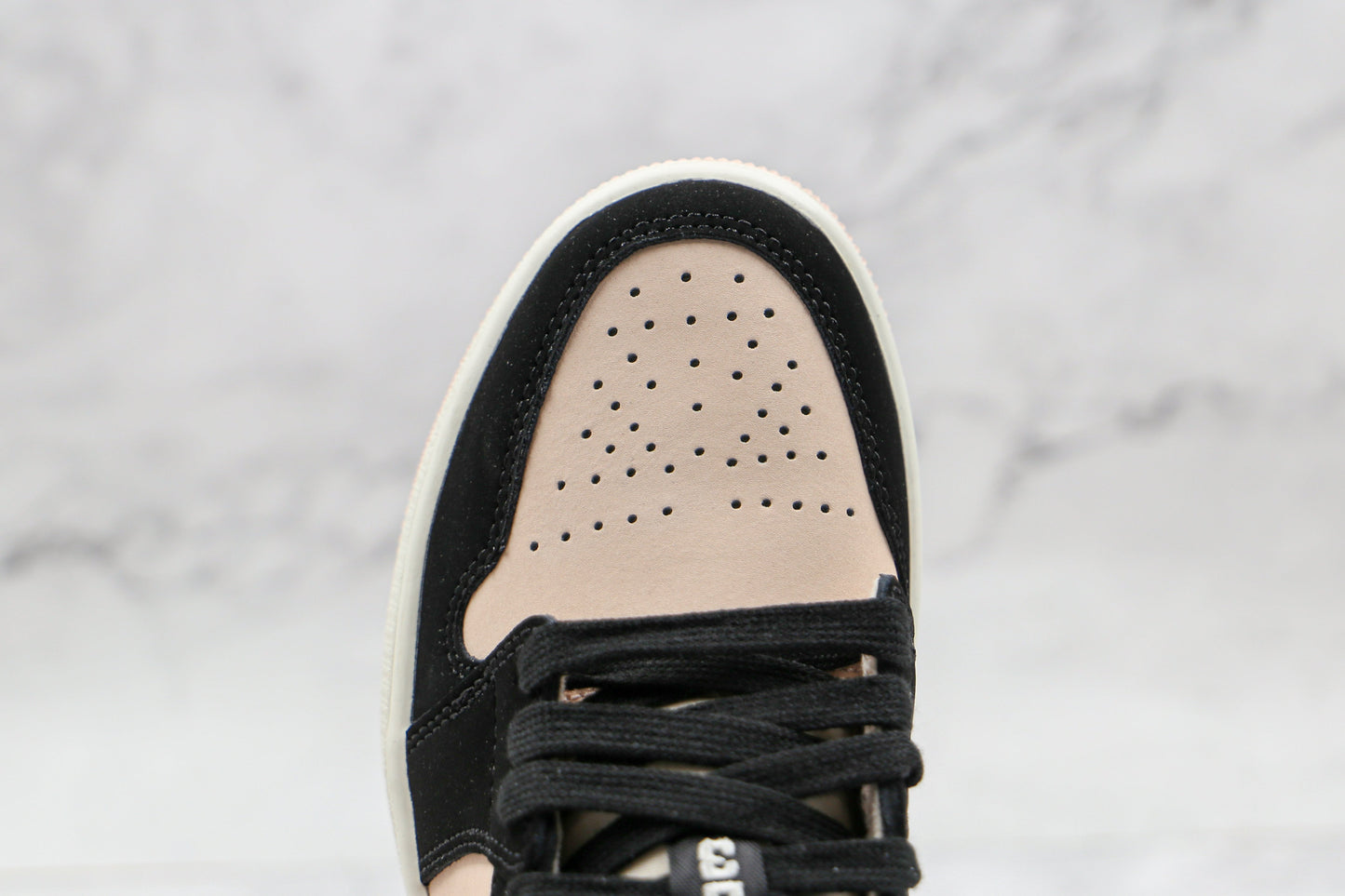 Jordan 1 Low Black Guava Ice 