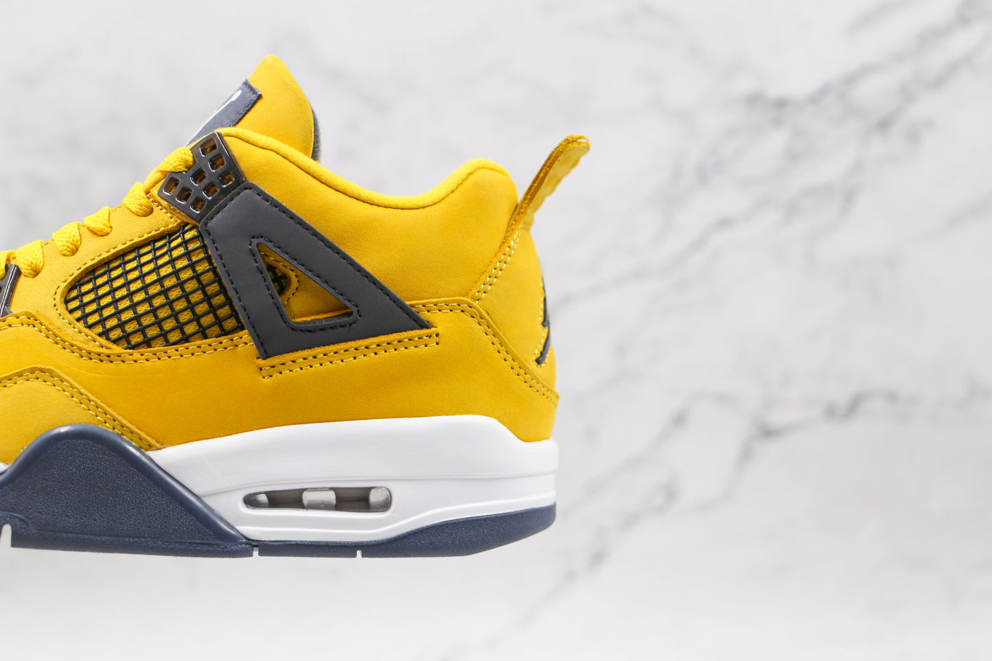 Jordan 4 Retro Lightning 