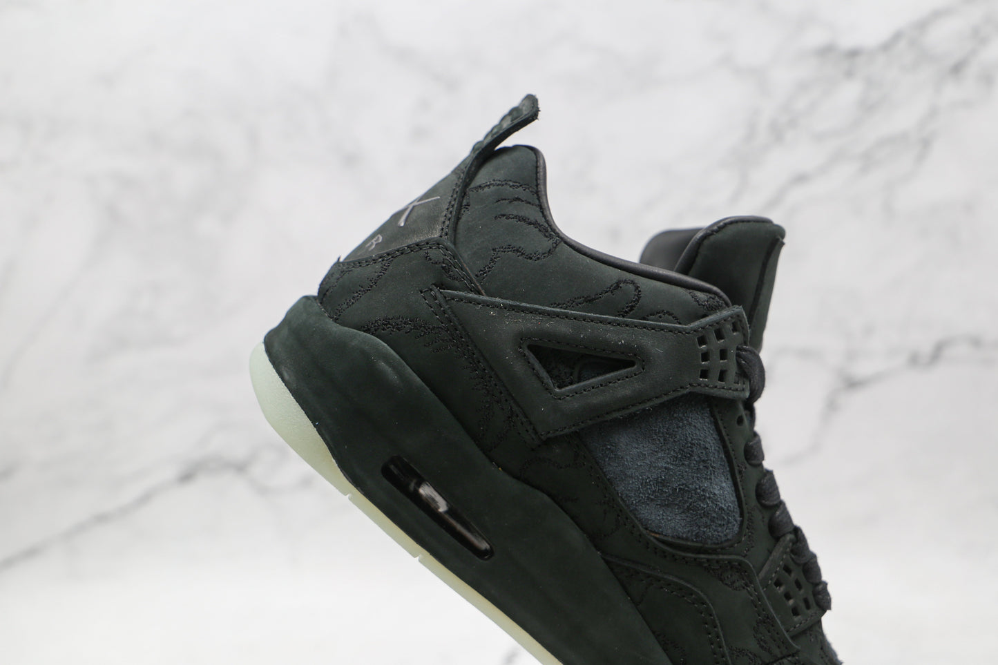 Jordan 4 Retro Kaws Black 