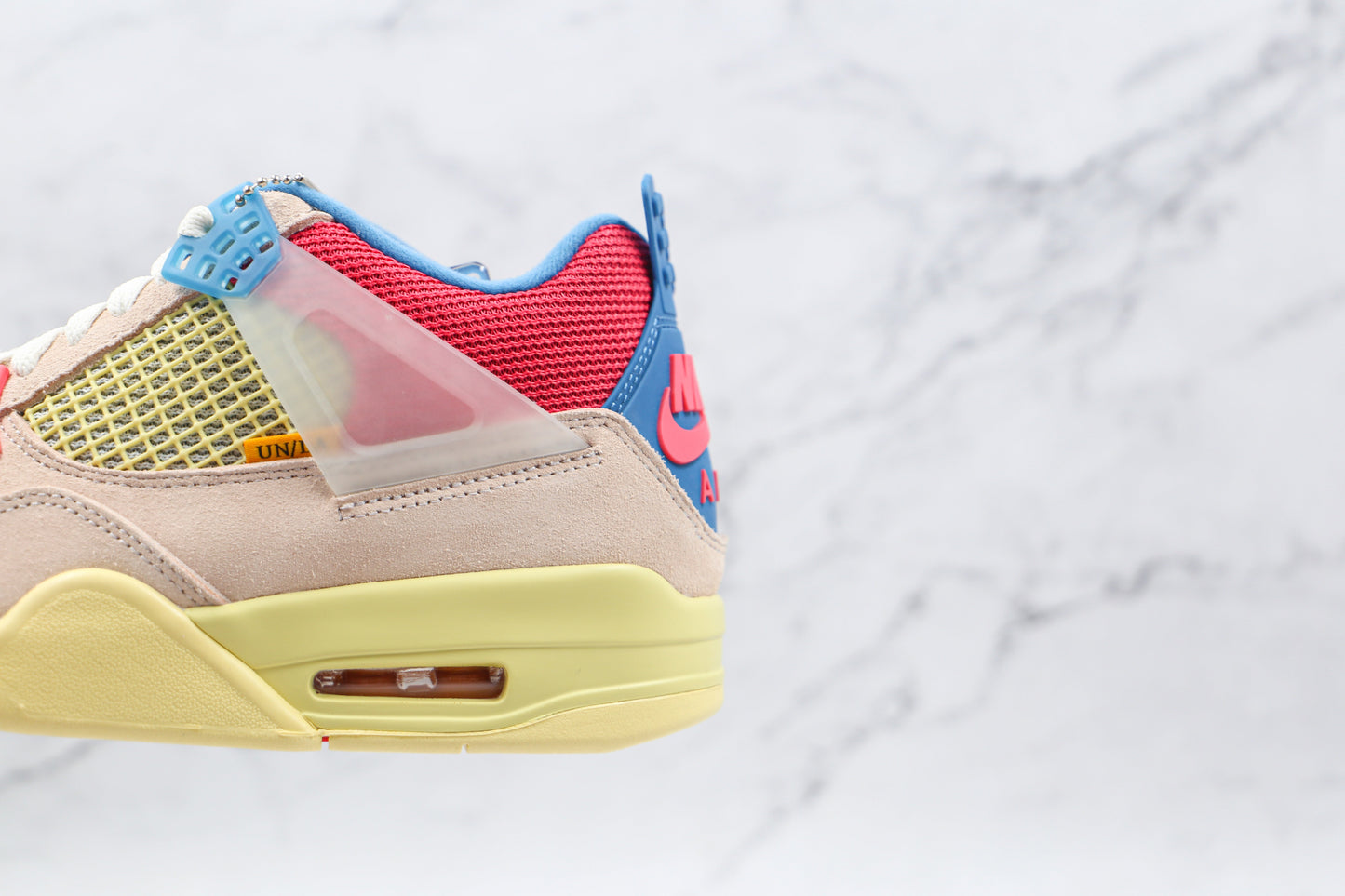 Jordan 4 Retro Union Guava Ice 