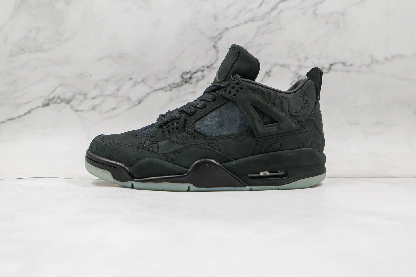 Jordan 4 Retro Kaws Black 