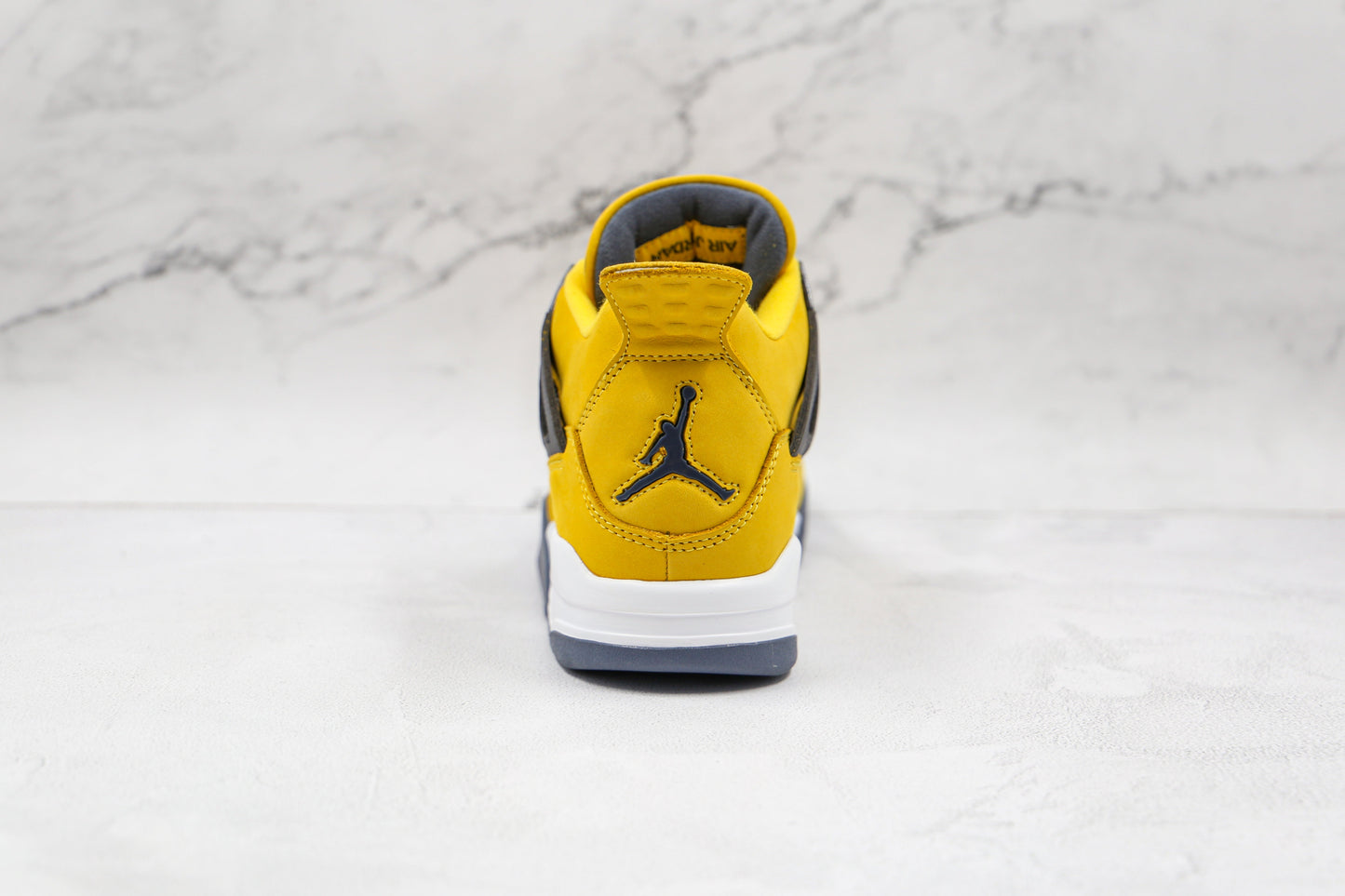 Jordan 4 Retro Lightning 