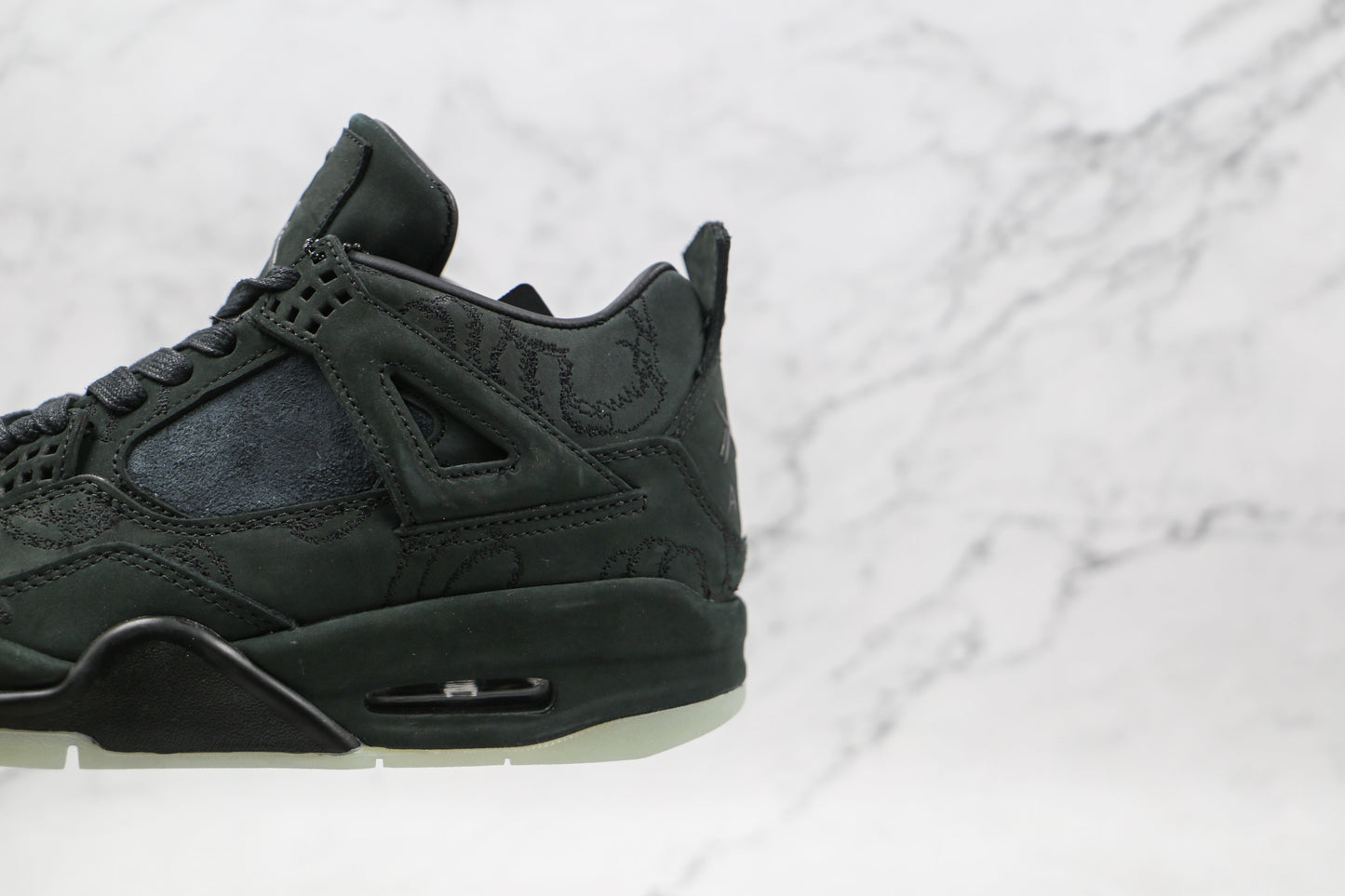 Jordan 4 Retro Kaws Black 
