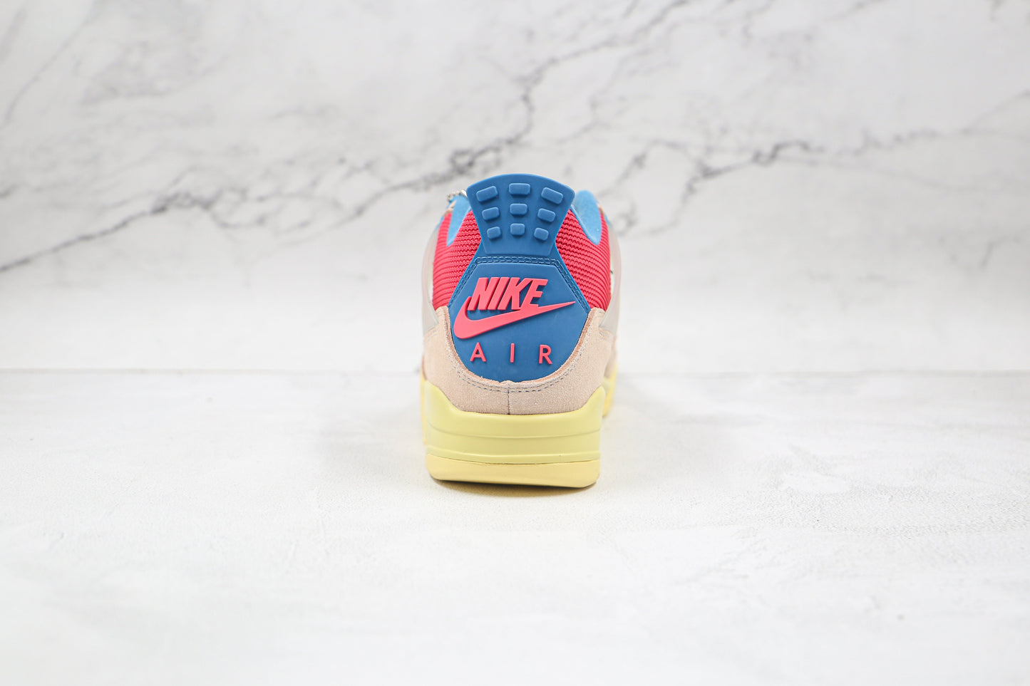 Jordan 4 Retro Union Guava Ice 