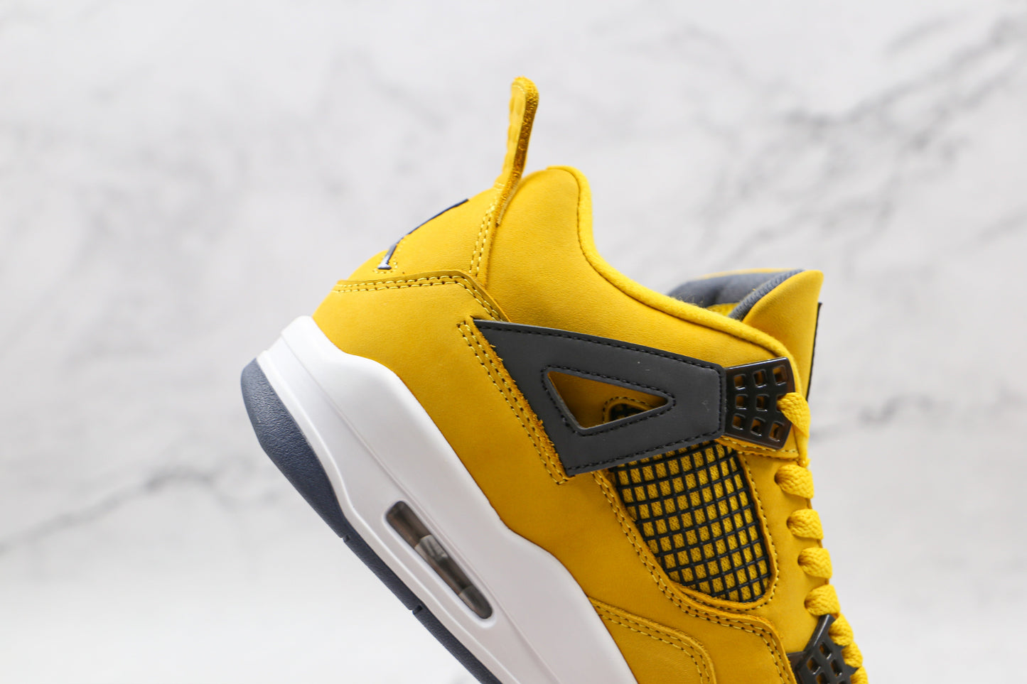 Jordan 4 Retro Lightning 