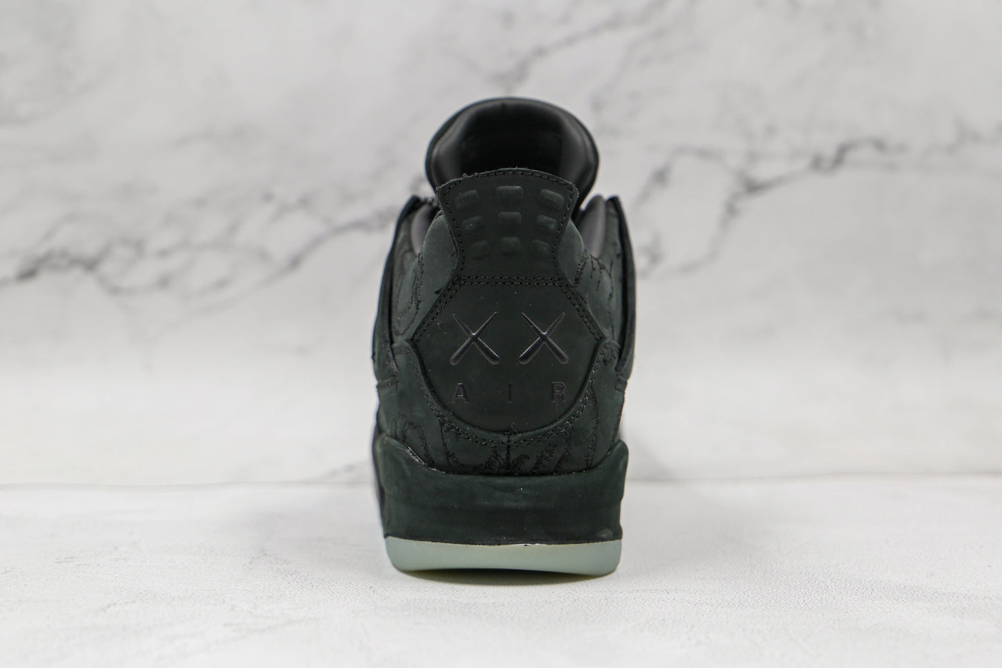 Jordan 4 Retro Kaws Black 