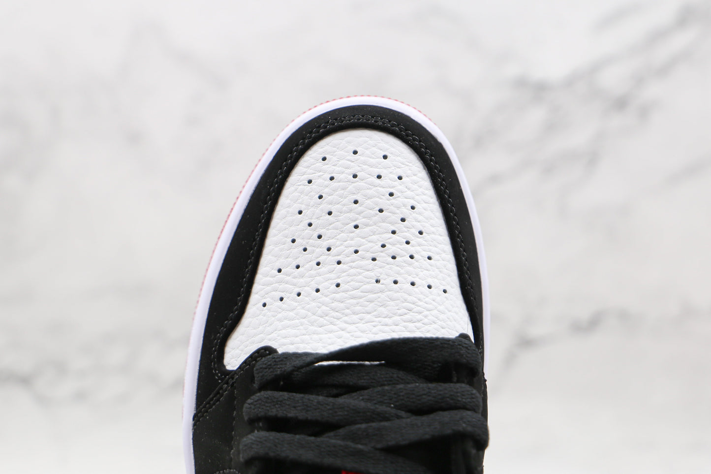 Jordan 1 Low Black Toe 