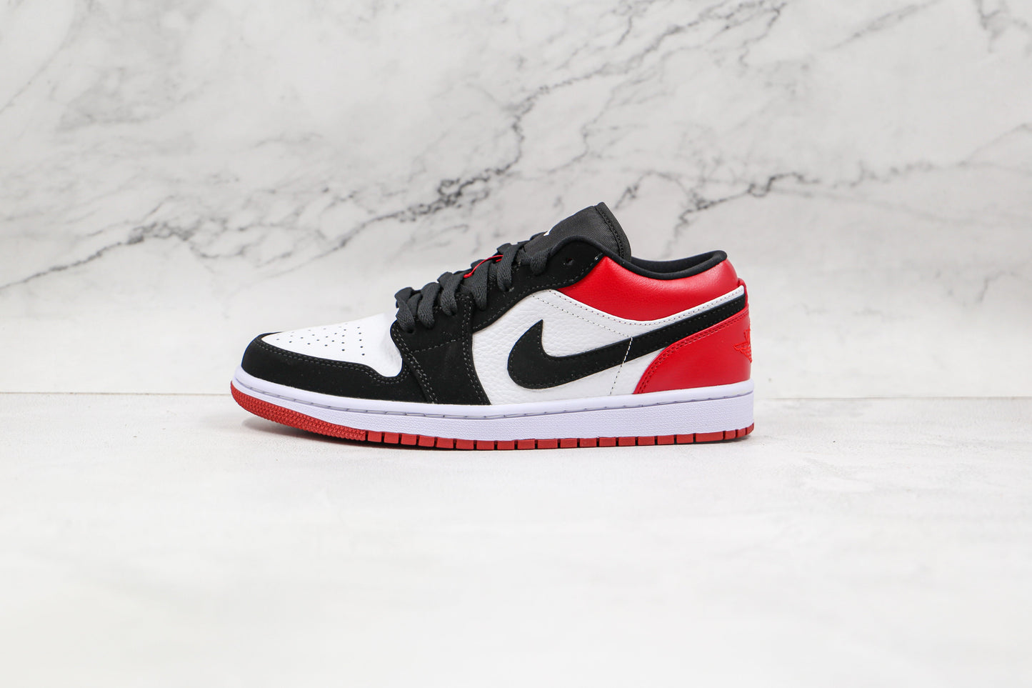 Jordan 1 Low Black Toe 