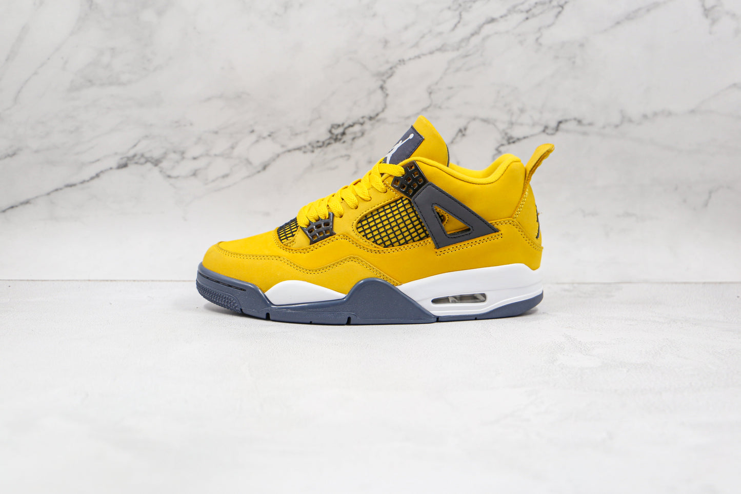 Jordan 4 Retro Lightning 